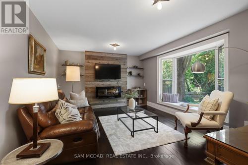 1449 Truscott Drive, Mississauga, ON - Indoor Photo Showing Living Room With Fireplace