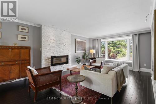 1449 Truscott Drive, Mississauga, ON - Indoor Photo Showing Living Room With Fireplace
