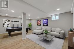Virtually Staged- Basement Rec Room - 