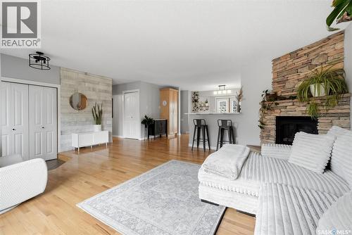 7310 Cribbs Bay, Regina, SK - Indoor With Fireplace