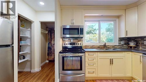 130 Cameron Crescent, Regina, SK - Indoor Photo Showing Kitchen With Double Sink