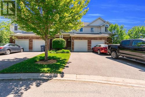 15 - 151 Clairfields Drive E, Guelph, ON - Outdoor With Facade