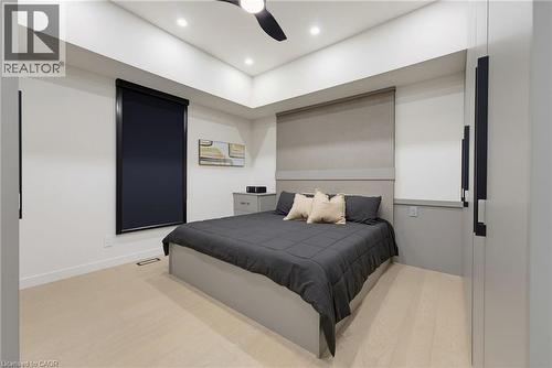 Bedroom featuring light wood-finish flooring and recessed ceiling lighting - 282 Robina Road, Ancaster, ON - Indoor Photo Showing Bedroom