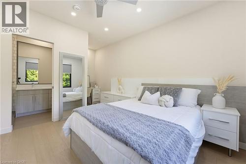 Bedroom featuring light wood-finish flooring, recessed lighting, and a ceiling fan - 282 Robina Road, Ancaster, ON - Indoor Photo Showing Bedroom