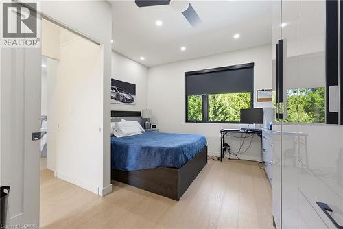 Bedroom featuring light wood-finish flooring, recessed lighting, and a ceiling fan - 282 Robina Road, Ancaster, ON - Indoor Photo Showing Bedroom