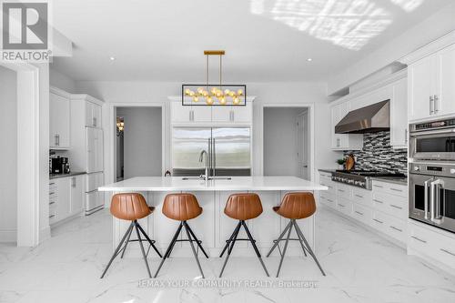 19 Redmond Crescent, Springwater, ON - Indoor Photo Showing Kitchen With Upgraded Kitchen