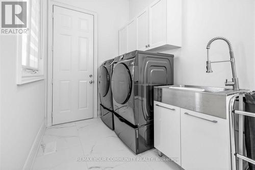 19 Redmond Crescent, Springwater, ON - Indoor Photo Showing Laundry Room