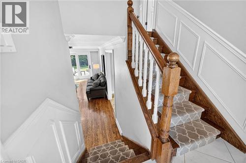 Hardwood flooring and decorative wall paneling - 11 Christman Court, Markham, ON - Indoor Photo Showing Other Room