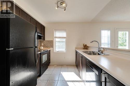 501 Cavanagh Lane, Milton, ON - Indoor Photo Showing Kitchen With Double Sink