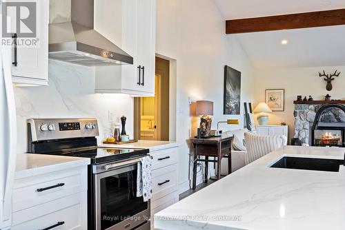 8 Firefly Way, Seguin, ON - Indoor Photo Showing Kitchen With Fireplace
