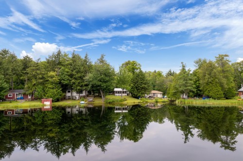 Façade - 48 Ch. Du Lac-Achigan, Val-Des-Monts, QC - Outdoor With Body Of Water With View