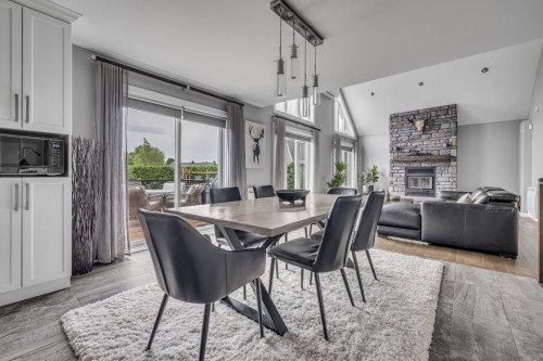 Salle à manger - 254 Rue Hamel, Saint-Gilles, QC - Indoor Photo Showing Dining Room With Fireplace