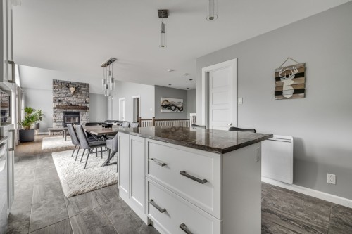 Cuisine - 254 Rue Hamel, Saint-Gilles, QC - Indoor With Fireplace