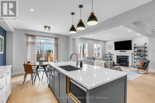 56 Pelham Crescent, Ottawa, ON - Indoor Photo Showing Kitchen With Fireplace With Upgraded Kitchen
