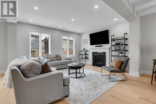 56 Pelham Crescent, Ottawa, ON - Indoor Photo Showing Living Room With Fireplace
