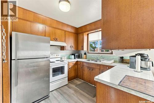75 Cannon Street, Regina, SK - Indoor Photo Showing Kitchen With Double Sink