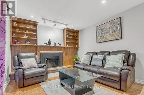 100 Warren Road, Kitchener, ON - Indoor Photo Showing Living Room With Fireplace