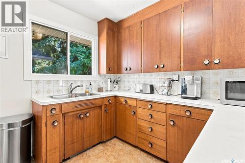 301 Cascade Street, Saskatoon, SK - Indoor Photo Showing Kitchen With Double Sink