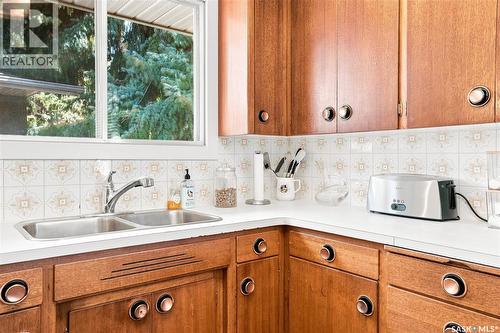 301 Cascade Street, Saskatoon, SK - Indoor Photo Showing Kitchen With Double Sink