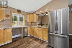 Spacious kitchen with abundant cabinetry - 