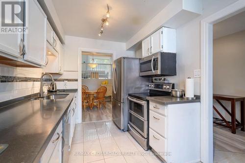 65 - 10 Rodda Boulevard, Toronto, ON - Indoor Photo Showing Kitchen With Double Sink