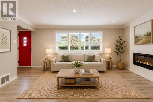 191 Nash Road N, Hamilton, ON - Indoor Photo Showing Living Room With Fireplace