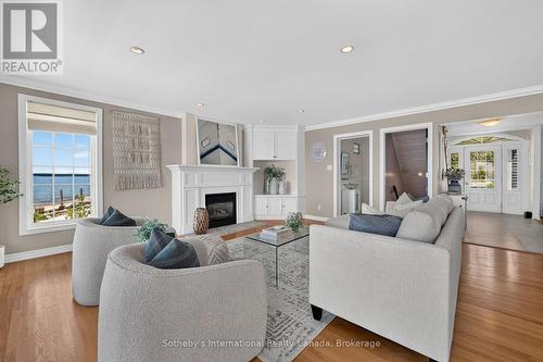 Living Room - 10 Lundy Lane, Tiny, ON - Indoor Photo Showing Living Room With Fireplace