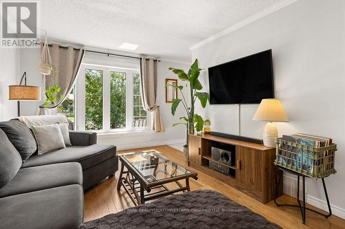 94 Monteagle Crescent, Kitchener, ON - Indoor Photo Showing Living Room With Fireplace