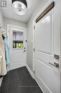 Door into the garage/Door to the backyard - 