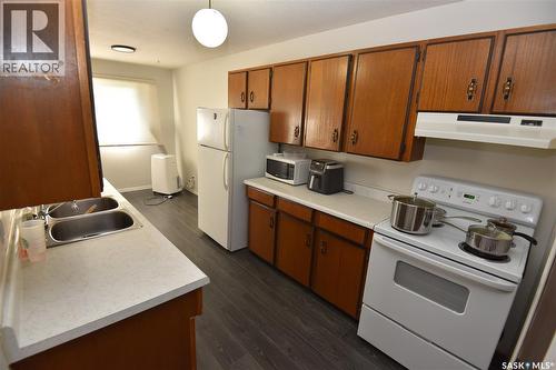 307 6Th Street E, Nipawin, SK - Indoor Photo Showing Kitchen With Double Sink