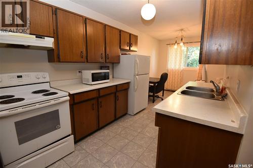 307 6Th Street E, Nipawin, SK - Indoor Photo Showing Kitchen With Double Sink