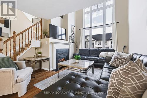 Spacious Living Room w/its cozy Gas Fireplace - 312 Galston Private, Ottawa, ON 