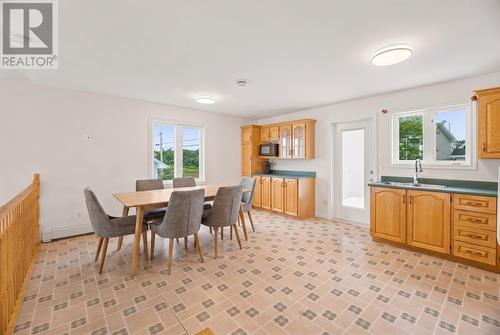Large kitchen with plenty of cabinets and counter space, AI generated photo - 29 Elgin Drive, Paradise, NL 