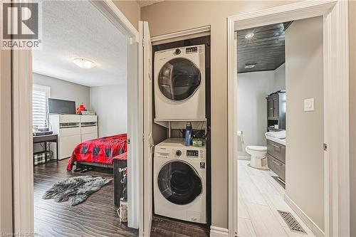 Stacked laundry appliances within a dedicated closet - 266 Limeridge Road E Unit# 3, Hamilton, ON 