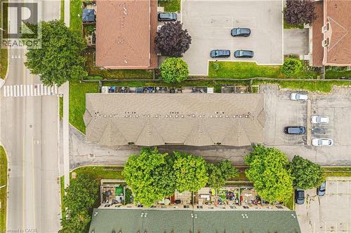 Residential property with multiple parking areas, mature trees, and street access - 266 Limeridge Road E Unit# 3, Hamilton, ON 