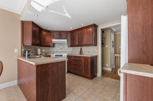 Kitchen - 19 Rue Pierre-Régis, Notre-Dame-Des-Prairies, QC 