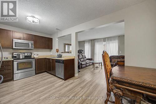 717 CRAWFORD CRESCENT , Woodstock (Woodstock - South), Ontario N4S 8Z5 4