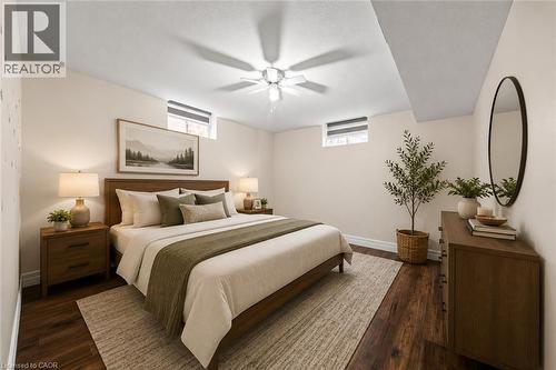 Recessed window, wood-finish flooring, ceiling fan, wood bed frame, wood nightstands - 495 Brigantine Drive, Waterloo, ON 