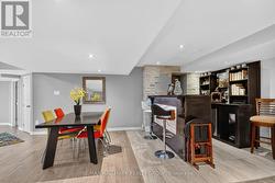 Lower level Built-in bar with sink and seating - 