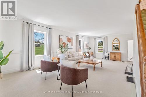 Living room offer large windows and natural light - 717218 1St Line E Ehs, Mulmur, ON 