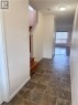 Foyer featuring square tile flooring and a neutral color palette - 452 Beaumont Crescent, Kitchener, ON 