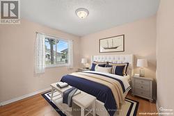 2nd bedroom. Virtually staged with furniture - 