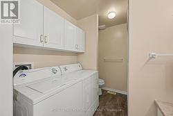 Full sized main floor laundry - 
