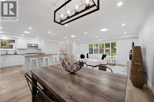 Spacious living area featuring an open-concept layout with recessed lighting throughout - 2306 Devon Road, Oakville, ON 