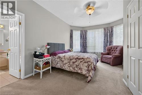 Primary bedroom with two closets and ensuite bathroom - 159 Thoroughbred Boulevard, Ancaster, ON 