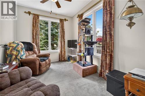Bedroom with two windows and closet. - 159 Thoroughbred Boulevard, Ancaster, ON 