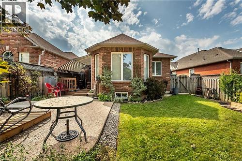 Brick exterior with multiple windows - 159 Thoroughbred Boulevard, Ancaster, ON 