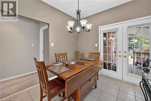 Neutral-toned walls complement the tiled flooring - 159 Thoroughbred Boulevard, Ancaster, ON 