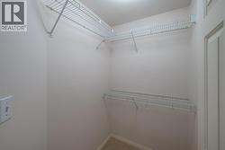 Walk-in closet primary bedroom - 
