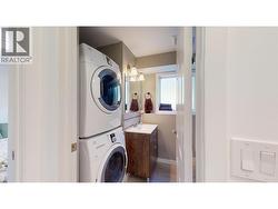 lower suite bathroom with stacking laundry - 